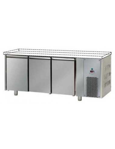 Refrigerated table without countertop and with...