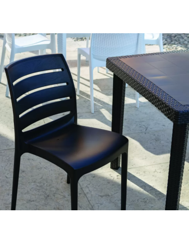 Polymer chair - Dimensions cm 45 x 57 x 83.5 h