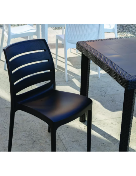 Polymer chair - Dimensions cm 45 x 57 x 83.5 h